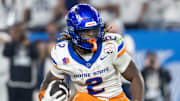 Boise State running back Ashton Jeanty runs with the ball.