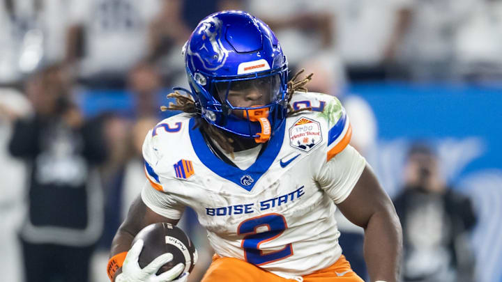 Boise State running back Ashton Jeanty runs with the ball. Boise State running back Ashton Jeanty runs with the ball.