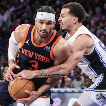 New York Knicks guard Josh Hart (3) looks to drive past Orlando Magic guard Cole Anthony (50) in the fourth quarter at Madison Square Garden. 