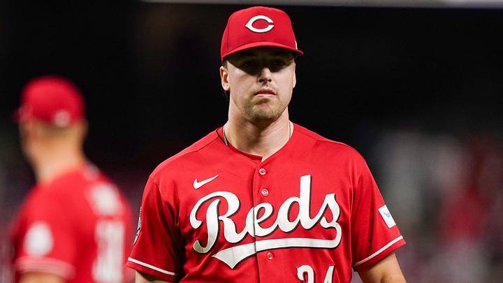 Cincinnati Reds pitcher Connor Phillips (34) walks off the field