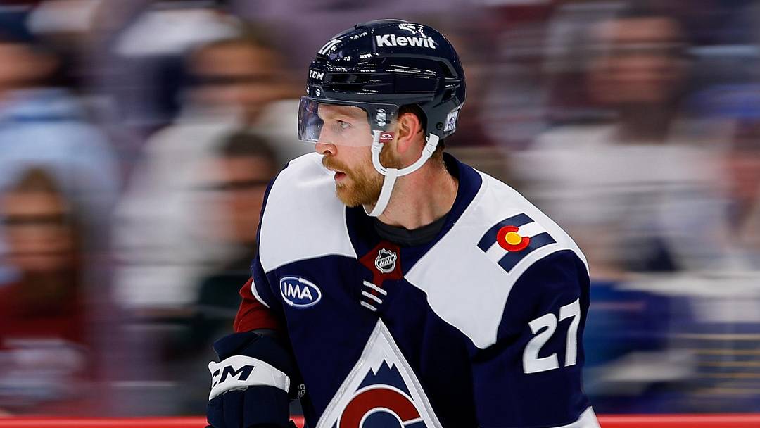 Apr 5, 2026; Denver, Colorado, USA; Colorado Avalanche defenseman Brett Kulak (27) controls the puck in the third period against the St. Louis Blues at Ball Arena. Mandatory Credit: Isaiah J. Downing-Imagn Images