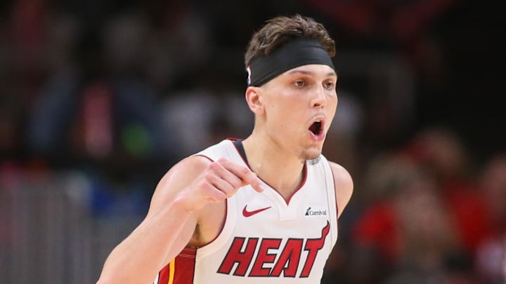 Apr 9, 2024; Atlanta, Georgia, USA; Miami Heat guard Tyler Herro (14) reacts after a basket against the Atlanta Hawks in the second half at State Farm Arena. Mandatory Credit: Brett Davis-Imagn Images