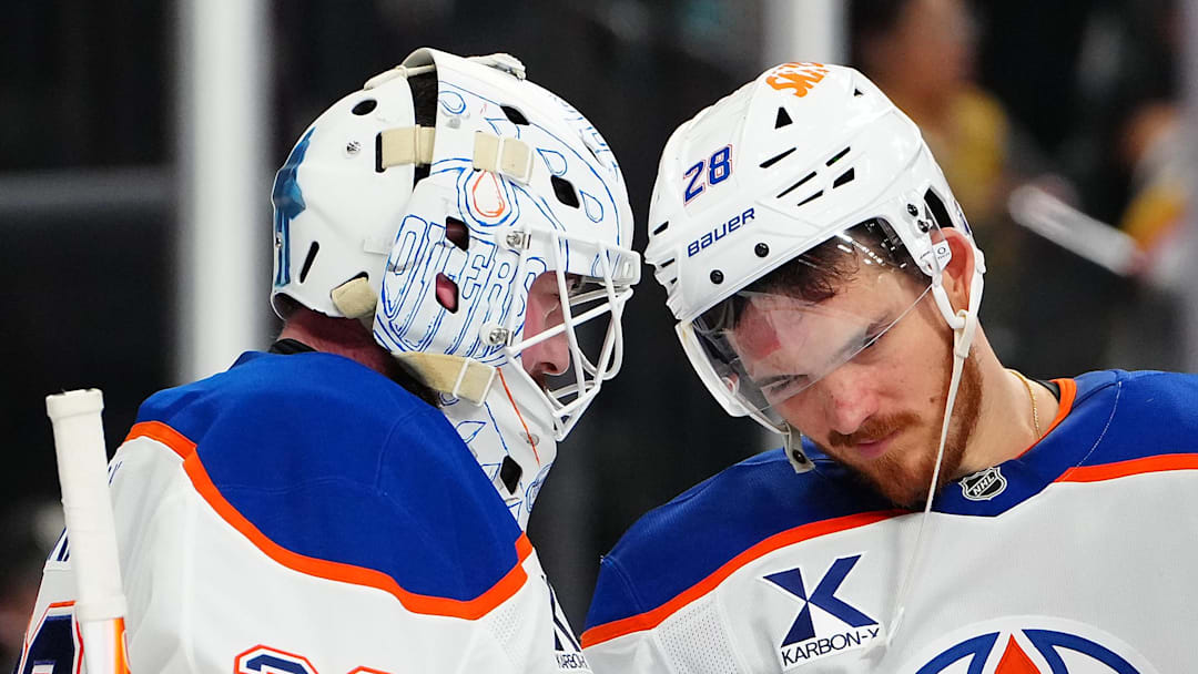 Mar 8, 2026; Las Vegas, Nevada, USA; Edmonton Oilers center Jack Roslovic (28) congratulates goaltender Connor Ingram (39) after the Oilers defeated the Vegas Golden Knights 4-2 at T-Mobile Arena. Mandatory Credit: Stephen R. Sylvanie-Imagn Images