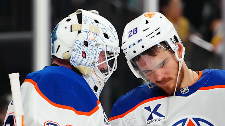 Mar 8, 2026; Las Vegas, Nevada, USA; Edmonton Oilers center Jack Roslovic (28) congratulates goaltender Connor Ingram (39) after the Oilers defeated the Vegas Golden Knights 4-2 at T-Mobile Arena. Mandatory Credit: Stephen R. Sylvanie-Imagn Images