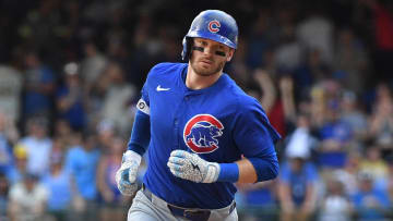 Jun 29, 2024; Milwaukee, Wisconsin, USA; Chicago Cubs outfielder Ian Happ (8) rounds the bases after hitting a home run against the Milwaukee Brewers in the eighth inning at American Family Field.