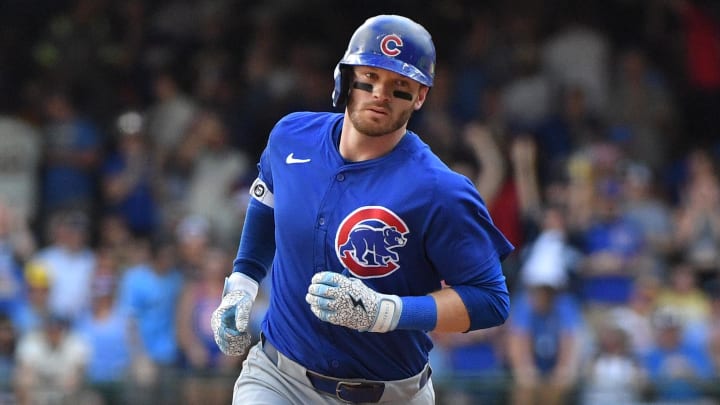 Jun 29, 2024; Milwaukee, Wisconsin, USA; Chicago Cubs outfielder Ian Happ (8) rounds the bases after hitting a home run against the Milwaukee Brewers in the eighth inning at American Family Field.