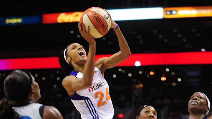 Sep 25, 2011; Phoenix, AZ, USA; Phoenix Mercury guard DeWanna Bonner (24) puts up a shot against the Minnesota Lynx during the second half at the US Airways Center.  The Lynx defeated the Mercury 103-86. Mandatory Credit: Jennifer Stewart-Imagn Images