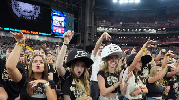 Purdue Boilermakers fans cheer before the national championship game of the Final Four of the 2024 NCAA Tournament between the Connecticut Huskies and the Purdue Boilermakers at State Farm Stadium. 