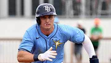 Mar 3, 2024; North Port, Florida, USA;   Tampa Bay Rays left fielder Jake Mangum (72)  heads for third base in the third inning of the spring training game against the Pittsburgh Pirates  at CoolToday Park. Mandatory Credit: Jonathan Dyer-Imagn Images