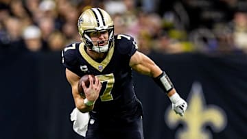 Nov 17, 2024; New Orleans, Louisiana, USA;  New Orleans Saints tight end Taysom Hill (7) runs after a catch against the Cleveland Browns during the first half at Caesars Superdome. Mandatory Credit: Stephen Lew-Imagn Images