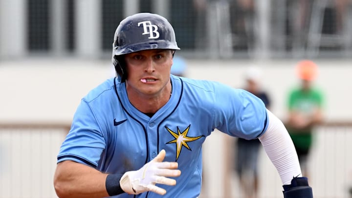 Mar 3, 2024; North Port, Florida, USA;   Tampa Bay Rays left fielder Jake Mangum (72)  heads for third base in the third inning of the spring training game against the Pittsburgh Pirates  at CoolToday Park. Mandatory Credit: Jonathan Dyer-Imagn Images