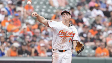 May 4, 2025; Baltimore, Maryland, USA; Baltimore Orioles third baseman Coby Mayo (16) throws out Kansas City Royals right fielder Hunter Renfroe (16) (not pictured) after fielding a ground ball during the eighth inning at Oriole Park at Camden Yards. 