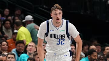 Oct 11, 2025; Dallas, Texas, USA; Dallas Mavericks forward Cooper Flagg (32) brings the ball up court against the Charlotte Hornets in the second half of a game at American Airlines Center. Mandatory Credit: Raymond Carlin III-Imagn Images