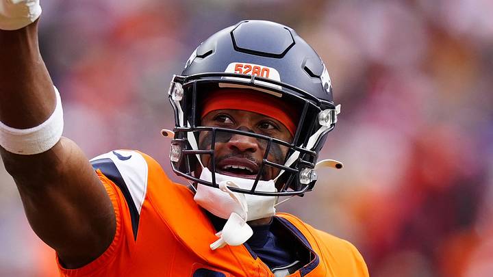 Jan 25, 2026; Denver, CO, USA; Denver Broncos wide receiver Courtland Sutton (14) reacts after catching a touchdown pass against the New England Patriots during the first half in the 2026 AFC Championship Game at Empower Field at Mile High. Mandatory Credit: Ron Chenoy-Imagn Images