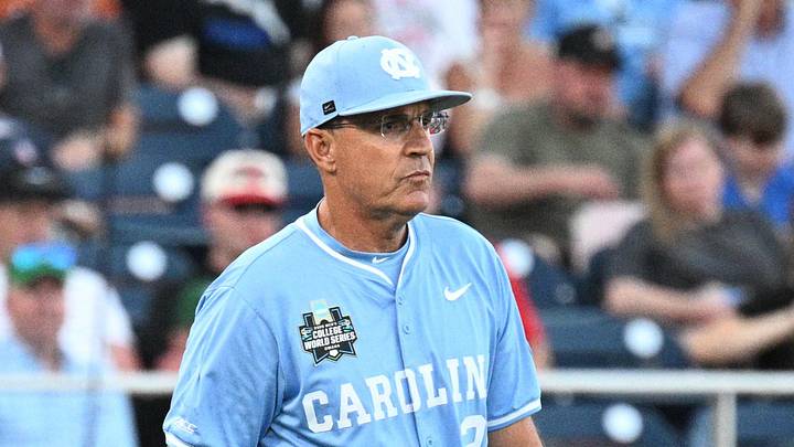 Jun 12, 2026; Omaha, NE, USA; North Carolina Tar Heels head coach Scott Forbes walks to the mound during the seventh inning against the Mississippi Rebels at Charles Schwab Field. Mandatory Credit: Steven Branscombe-Imagn Images
