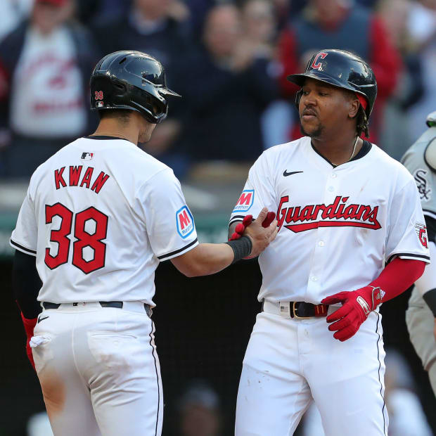 Jose Ramirez celebrates with Steven Kwan after a home run 