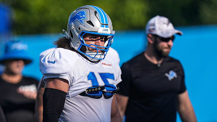 Detroit Lions linebacker Grant Stuard (15), center, practices during training camp at Meijer Performance Center in Allen Park on Monday, July 28, 2025.