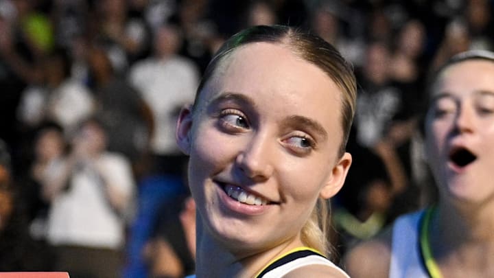 Dallas Wings guard Paige Bueckers smiles after the game against the Phoenix Mercury.