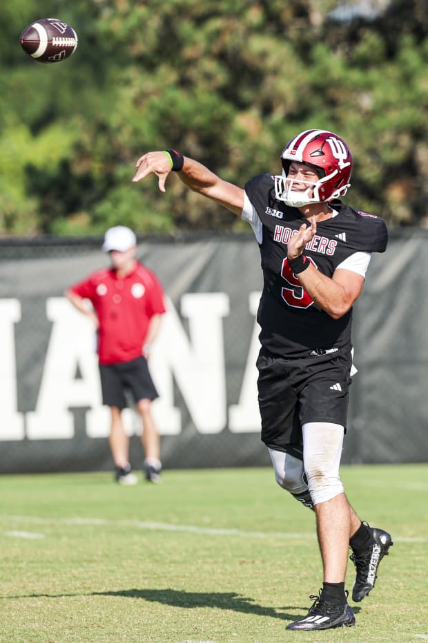 Indiana quarterback Kurtis Rourke tosses a pass during a practice on Aug. 6, 2024.