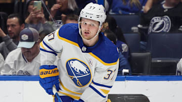 Feb 29, 2024; Tampa, Florida, USA;  Buffalo Sabres center Casey Mittelstadt (37) controls the puck against the Tampa Bay Lightning in the third period at Amalie Arena. Mandatory Credit: Nathan Ray Seebeck-Imagn Images