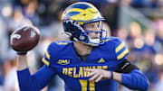 Delaware quarterback Nick Minicucci throws in the fourth quarter of the Blue Hens' 28-14 win against Albany at Delaware Stadium, Saturday, Oct. 26, 2024.