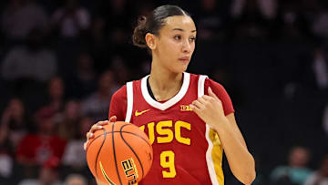 Nov 9, 2025; Charlotte, North Carolina, USA; Southern California Trojans guard Jazzy Davidson (9) dribbles the ball against the NC State Wolfpack during the third quarter of the Ally Tipoff game at Spectrum Center. Mandatory Credit: Cory Knowlton-Imagn Images