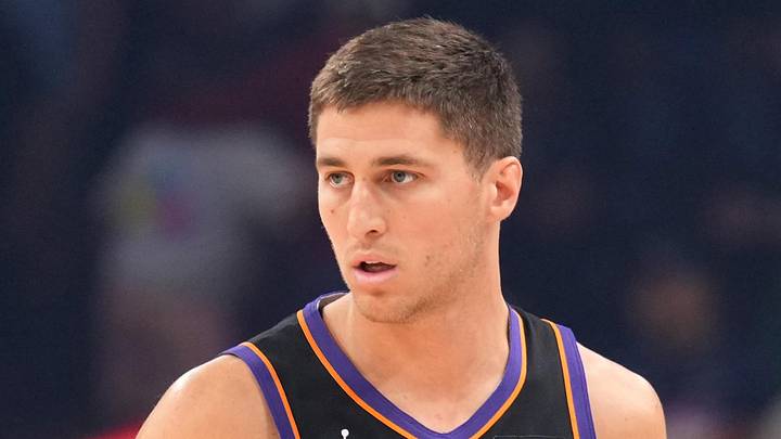 Mar 21, 2026; Phoenix, Arizona, USA; Phoenix Suns guard Collin Gillespie (12) dribbles against the Milwaukee Bucks during the first half at Mortgage Matchup Center. Mandatory Credit: Joe Camporeale-Imagn Images