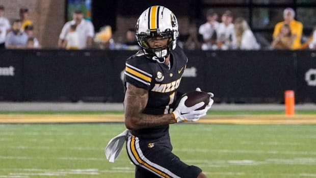 Missouri Tigers wide receiver Theo Wease catches a pass during a college football game in the SEC.