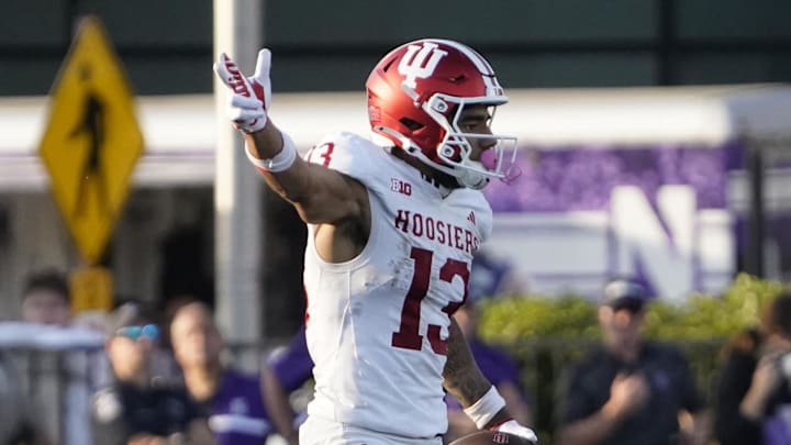 Oct 5, 2024; Evanston, Illinois, USA; Indiana Hoosiers wide receiver Elijah Sarratt (13) gestures for a first down against the Northwestern Wildcats during the second half at Lanny and Sharon Martin Stadium. Mandatory Credit: David Banks-Imagn Images
