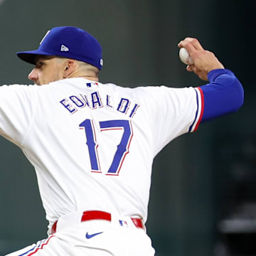 Jul 2, 2024; Arlington, Texas, USA;  Texas Rangers starting pitcher Nathan Eovaldi (17) throws during the seventh inning against the San Diego Padres at Globe Life Field