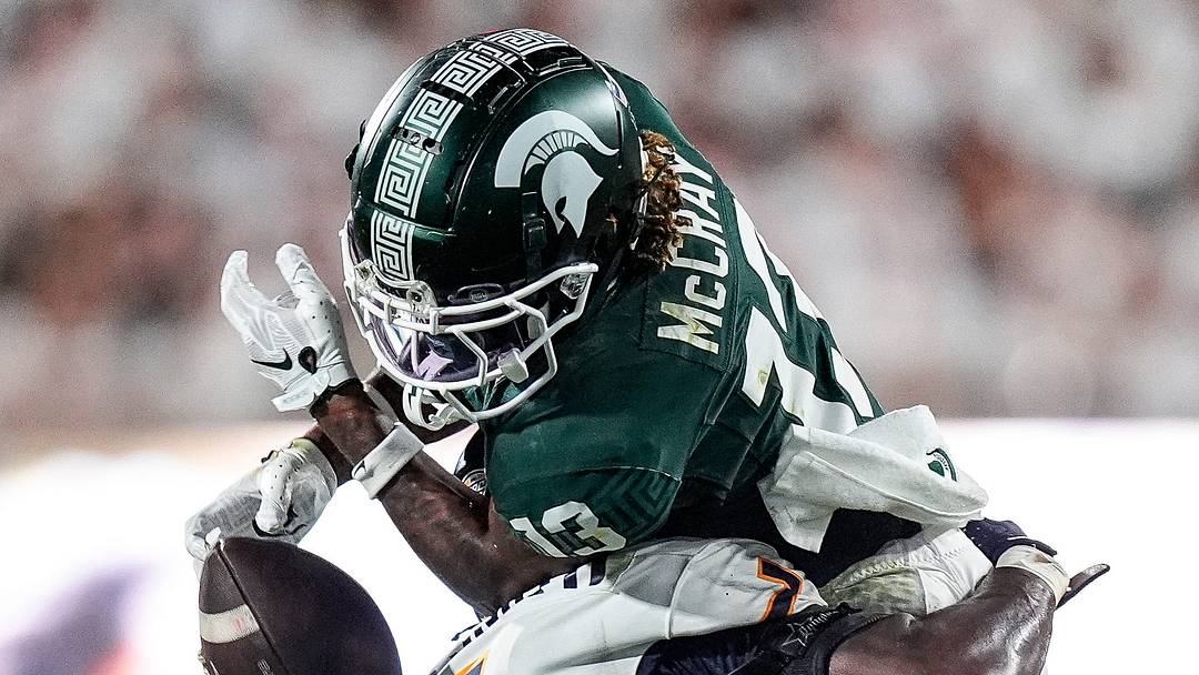 Toledo safety Armorion Smith (7) tackles Michigan State wide receiver Chrishon McCray (13) during the second half at Spartan Stadium in East Lansing on Friday, Sept. 4, 2026.