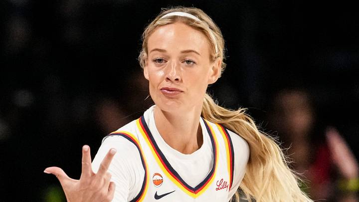 Indiana Fever guard Sophie Cunningham (8) celebrates a 3-pointer Sunday.