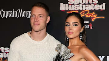 Christian McCaffrey and Olivia Culpo at the 2023 Sports Illustrated Super Bowl Party.