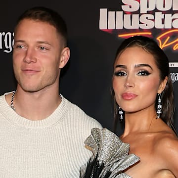 Christian McCaffrey and Olivia Culpo at the 2023 Sports Illustrated Super Bowl Party.