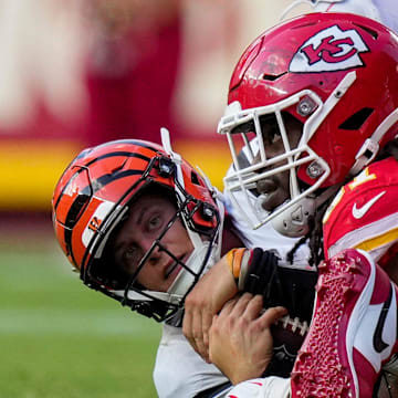 Cincinnati Bengals quarterback Joe Burrow (9) is sacked in the fourth quarter of the NFL Week 2 game between the Kansas City Chiefs and the Cincinnati Bengals at Arrowhead Stadium in Kansas City on Sunday, Sept. 15, 2024. The Chiefs took a 26-25 win with a go-ahead field goal as time expired.