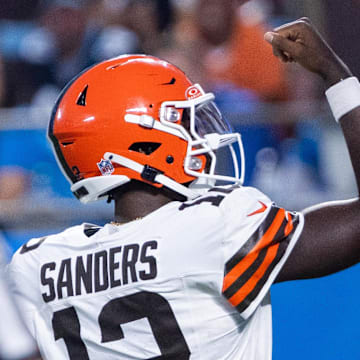 Cleveland Browns quarterback Shedeur Sanders celebrates after a touchdown against the Carolina Panthers.