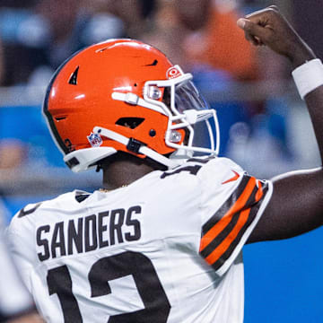 Aug 8, 2025; Charlotte, North Carolina, USA; Cleveland Browns quarterback Shedeur Sanders (12) celebrates after a touchdown in the second quarter against the Carolina Panthers at Bank of America Stadium. Mandatory Credit: Scott Kinser-The USAToday Network via Imagn Images 