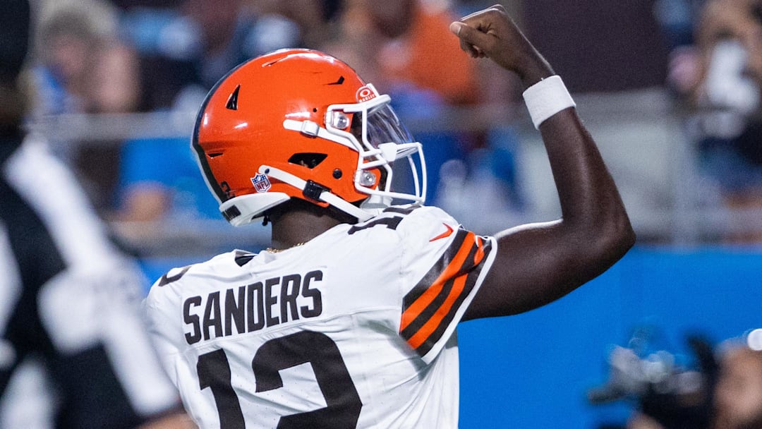 Aug 8, 2025; Charlotte, North Carolina, USA; Cleveland Browns quarterback Shedeur Sanders (12) celebrates after a touchdown in the second quarter against the Carolina Panthers at Bank of America Stadium. Mandatory Credit: Scott Kinser-The USAToday Network via Imagn Images 