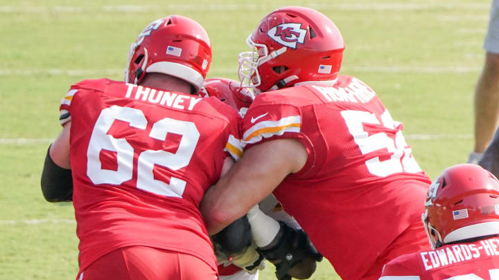 Aug 9, 2021; St. Joseph, MO, USA; Kansas City Chiefs offensive guard Joe Thuney (62) and center Creed Humphrey (52) block during training camp at Missouri Western State University. Mandatory Credit: Denny Medley-USA TODAY Sports