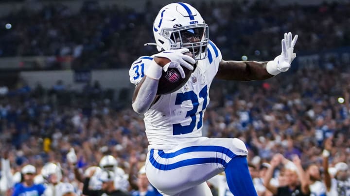 Indianapolis Colts running back Tyler Goodson (31) jumps into the end zone for a touchdown Saturday, Aug. 17, 2024, before a preseason game between the Indianapolis Colts and the Arizona Cardinals at Lucas Oil Stadium in Indianapolis.