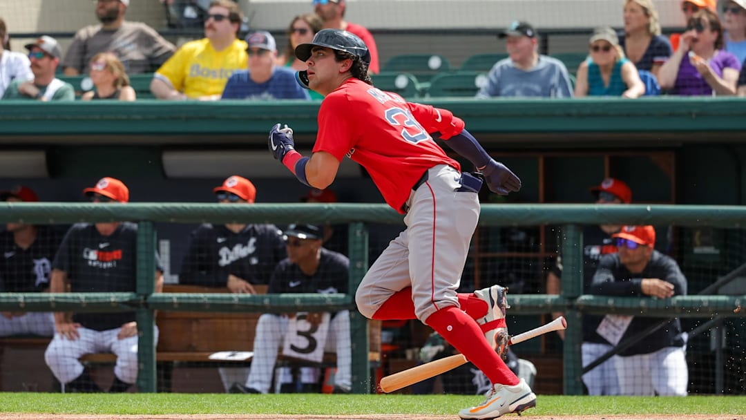 Boston Red Sox third baseman Marcelo Mayer (39) watches his fly ball during the first inning against the Detroit Tigers at Publix Field at Joker Marchant Stadium