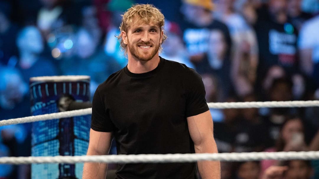 Logan Paul enters the ring at a WWE event. 