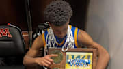 Wayzata guard Christian Wiggins celebrates the Class 4A state championship.