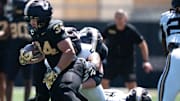 Vanderbilt running back Johann Cardenas (34) runs during the Vanderbilt Football Black and Gold Spring Game at FirstBank Stadium in Nashville, Tenn., Saturday, April 12, 2025.