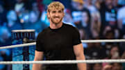 Logan Paul enters the ring at a WWE event. 