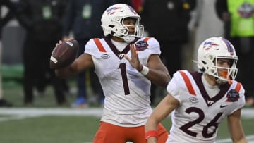 Dec 27, 2023; Annapolis, MD, USA;  Virginia Tech Hokies quarterback Kyron Drones (1) throws to tight end Harrison Saint Germain (87)  for a second quarter touchdown against the Tulane Green Wave at Navy-Marine Corps Memorial Stadium. Mandatory Credit: Tommy Gilligan-USA TODAY Sports