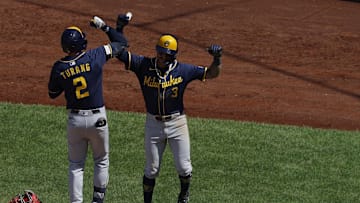 Aug 3, 2025; Washington, District of Columbia, USA; Milwaukee Brewers second baseman Brice Turang (2) celebrates with Brewers shortstop Joey Ortiz (3) after hitting a two run home run against the Washington Nationals during the seventh inning at Nationals Park. Mandatory Credit: Geoff Burke-Imagn Images