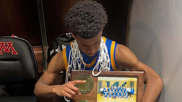 Wayzata guard Christian Wiggins celebrates the Class 4A state championship.