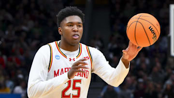  Maryland Terrapins center Derik Queen (25) passes the ball against the Colorado State Rams in the first half at Climate Pledge Arena during the second round of the NCAA tournament. 