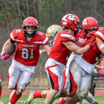 CVU's Alex Provost runs for daylight during the Redhawks' D1 football semifinal vs the Essex Hornets on Saturday afternoon in Hinesburg D1 Football Semifinal Essex At CVU Nov 5, 2022 / AL FREY/ FOR THE FREE PRESS / USA TODAY NETWORK